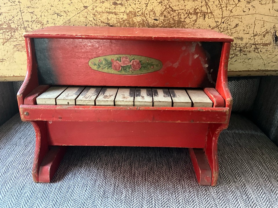 Unusual RED Schoenhut petite childs piano. Smaller than the often seen version. Measuring 10”x8”x6”. Keys play nicely. A lovely piece to display alongside your dolls or bears. $75